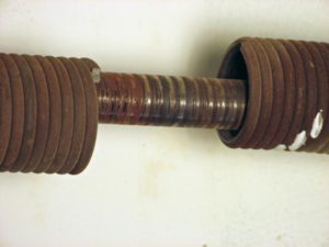 image of a split garage door spring