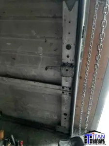 commercial bay door missing hinge