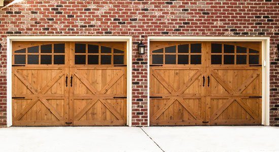 two single garage doors top section glass by amarr
